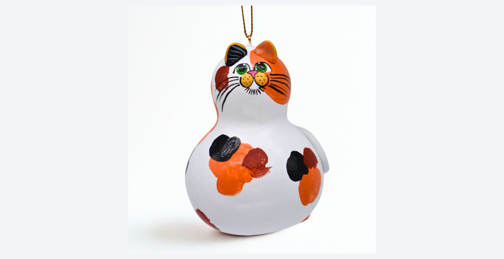 Hand painted calico cat ornament on natural dried gourd with unique markings