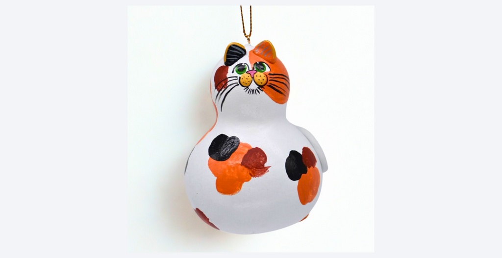 Hand painted calico cat ornament on natural gourd with unique markings, perfect cat lover gift or pet memorial