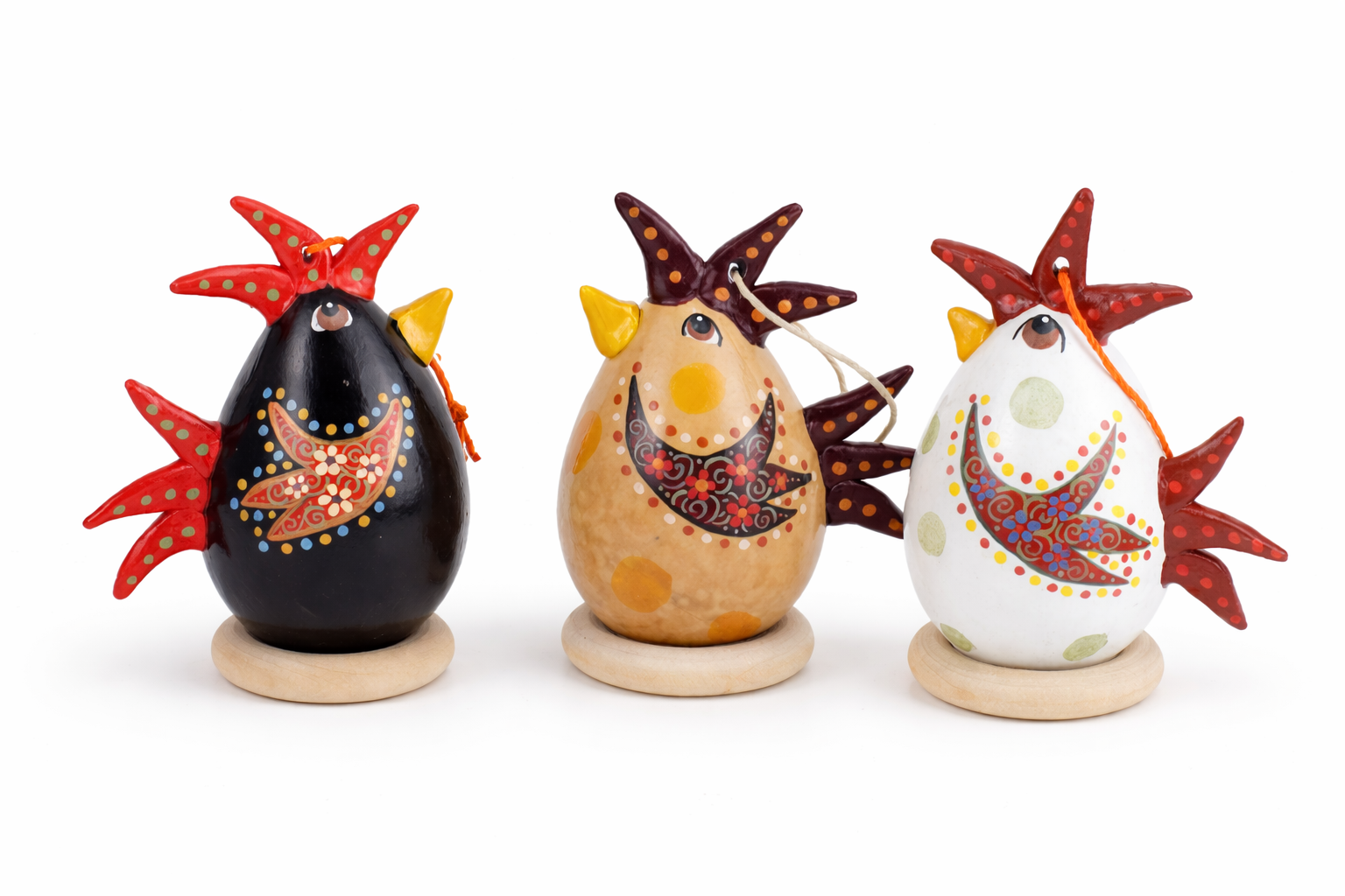 Set of three handmade chicken ornaments crafted from natural dried gourds with colorful folk art painting