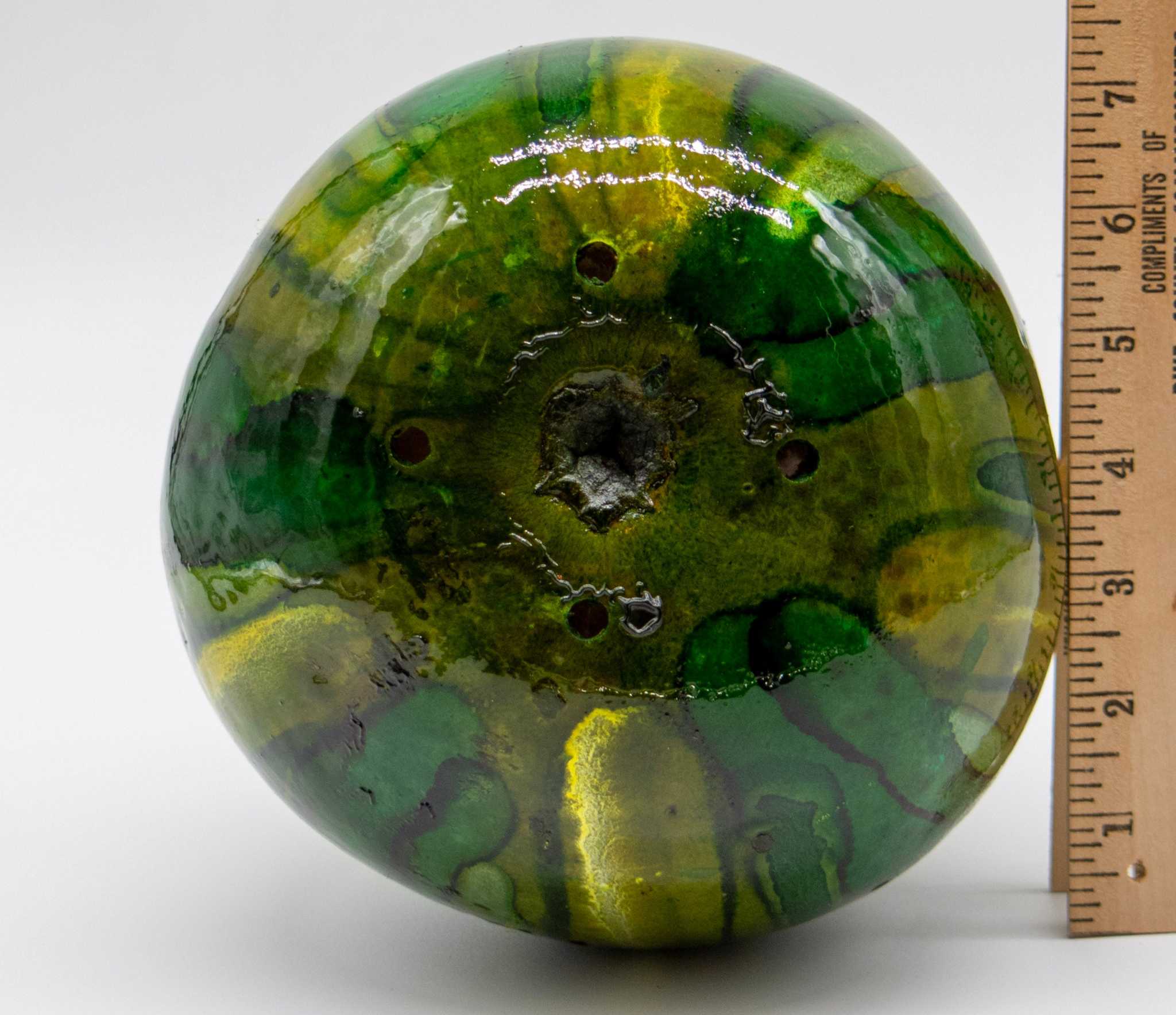 Handmade green striped gourd birdhouse with 1.5" entrance hole for wrens and chickadees, natural breathable material, ready to hang