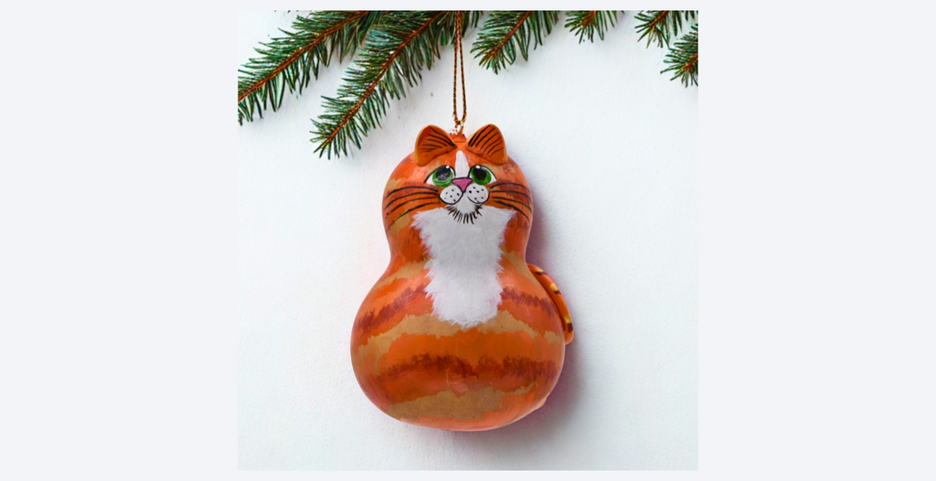 Hand painted orange tabby cat gourd ornament with white bib and natural dried gourd base