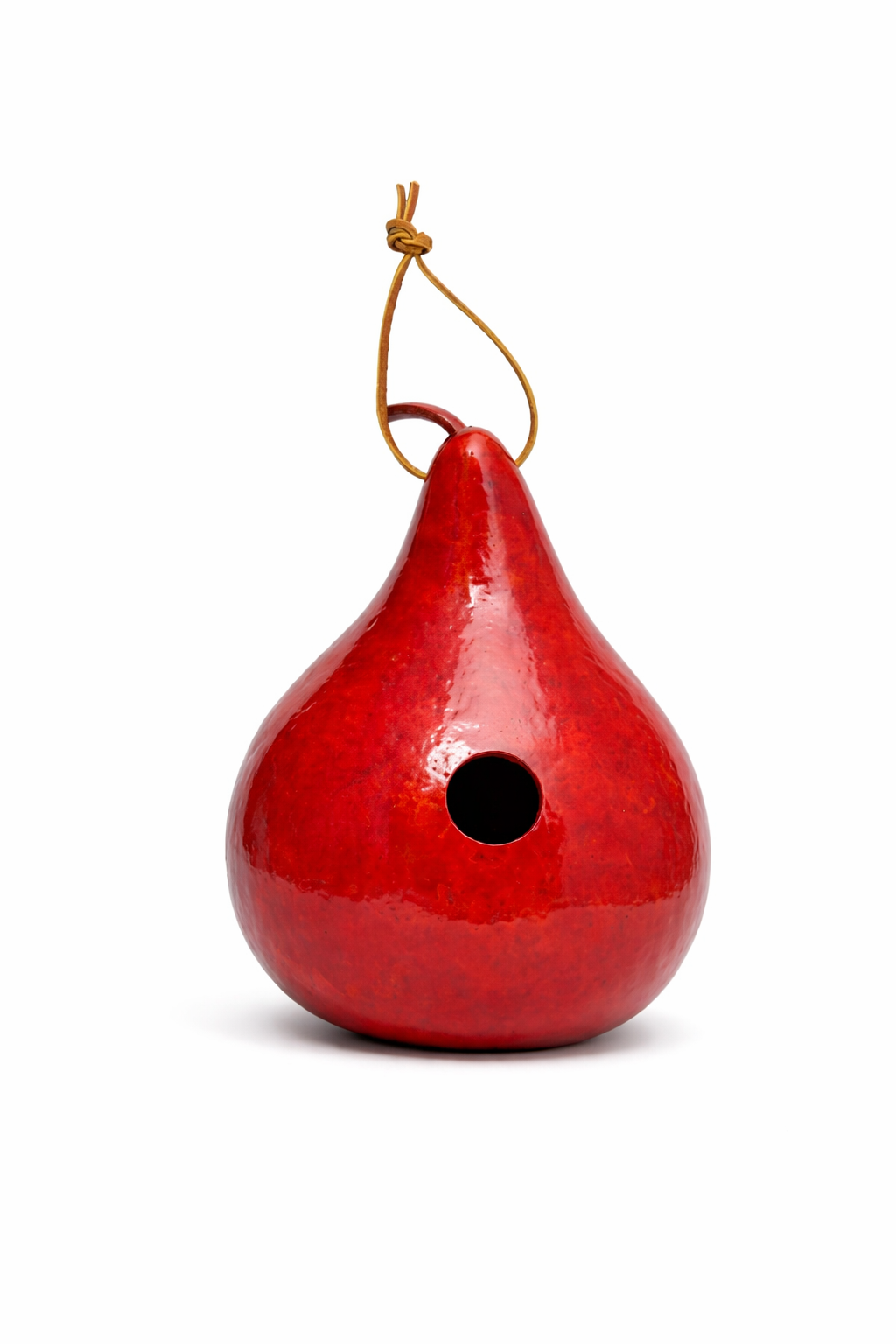Hand dyed gourd birdhouse with natural texture and 1.5" entrance for small birds