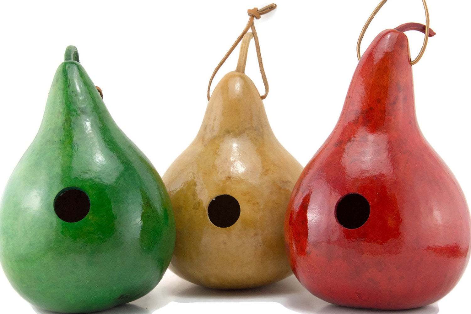 Hand painted gourd birdhouse set of 3 in red, yellow and lime green with round entrance holes on white background