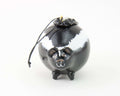 Handcrafted black and white skunk ornament made from dried gourd
