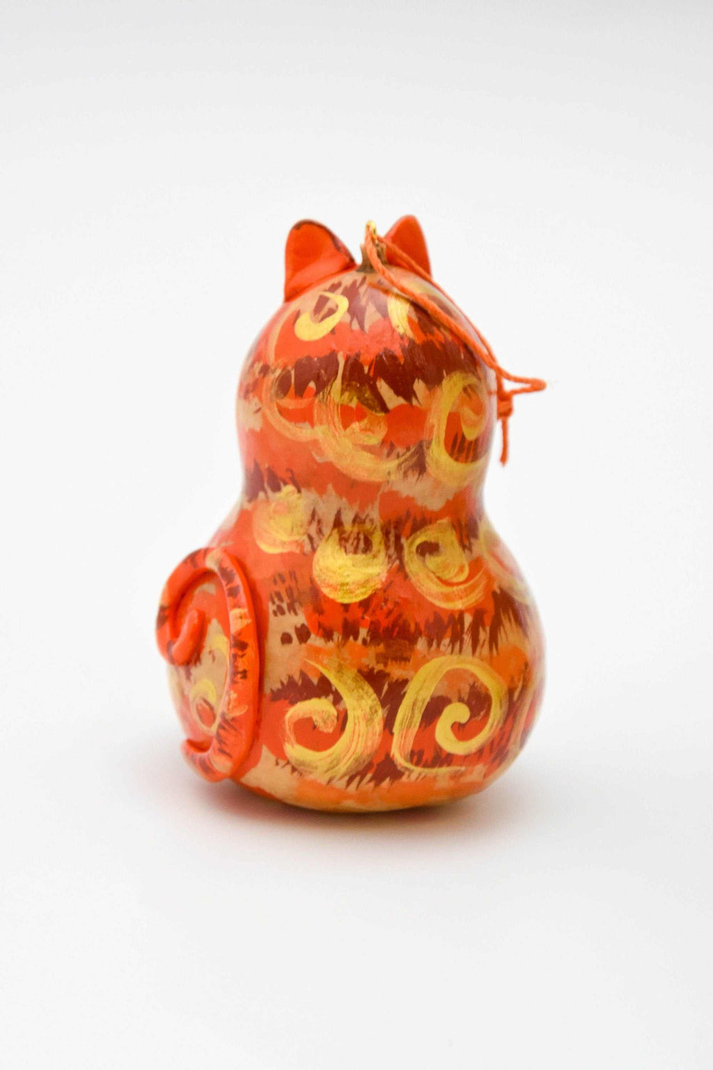Orange tabby cat ornament made from painted gourd with resin ears and tail, designed as a durable Christmas decoration
