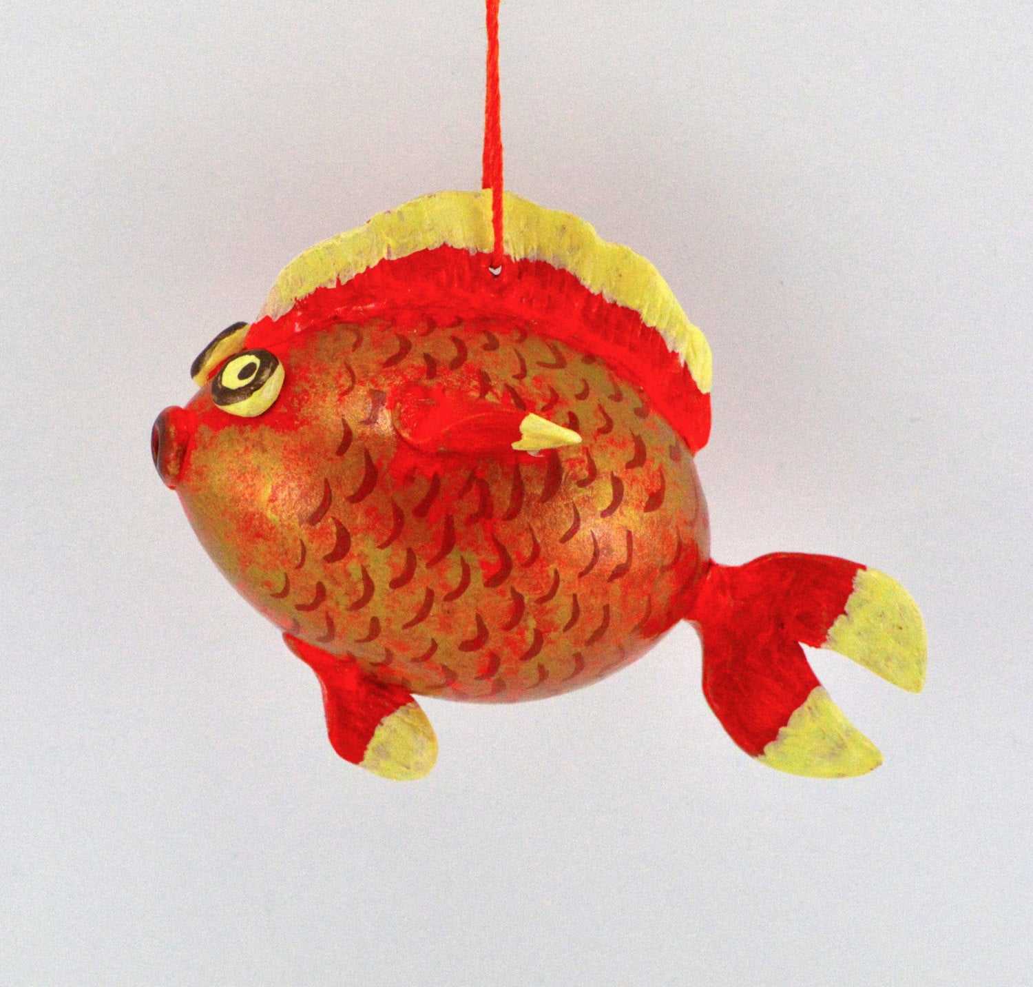 Handmade painted goldfish gourd ornament with red and yellow accents, unique holiday fishing gift.